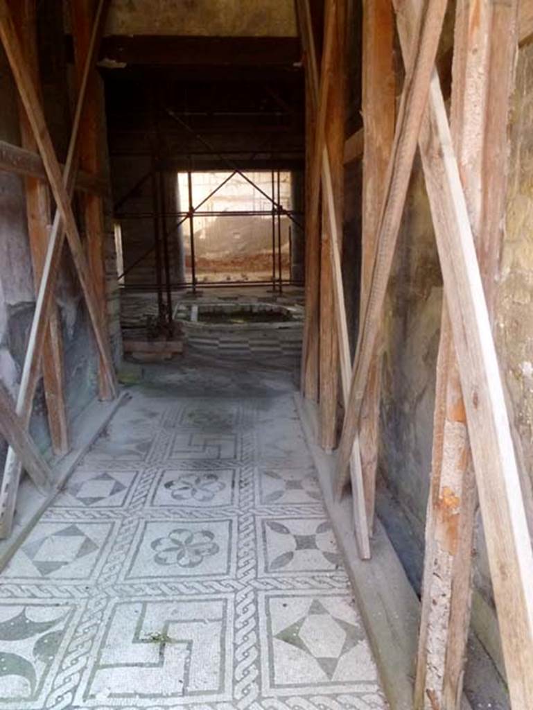 IV.2, Herculaneum, October 2012. Looking east along entrance corridor towards atrium, from entrance doorway. Photo courtesy of Michael Binns.